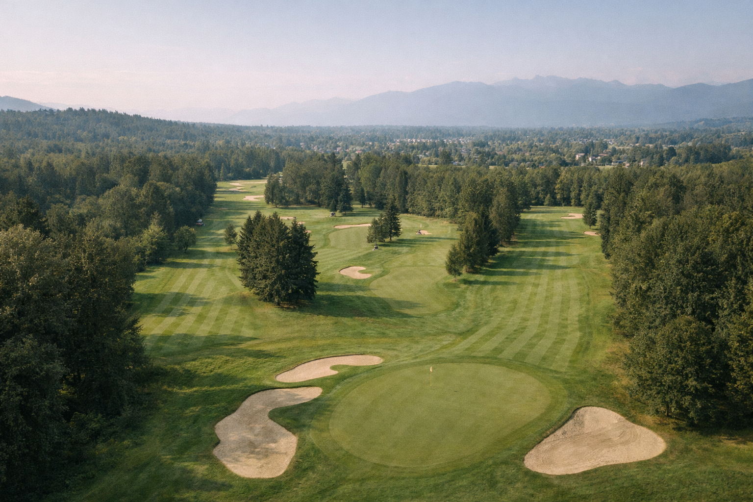 golf-course-landscape-at-maple-ridge-with-nature-and-mountains