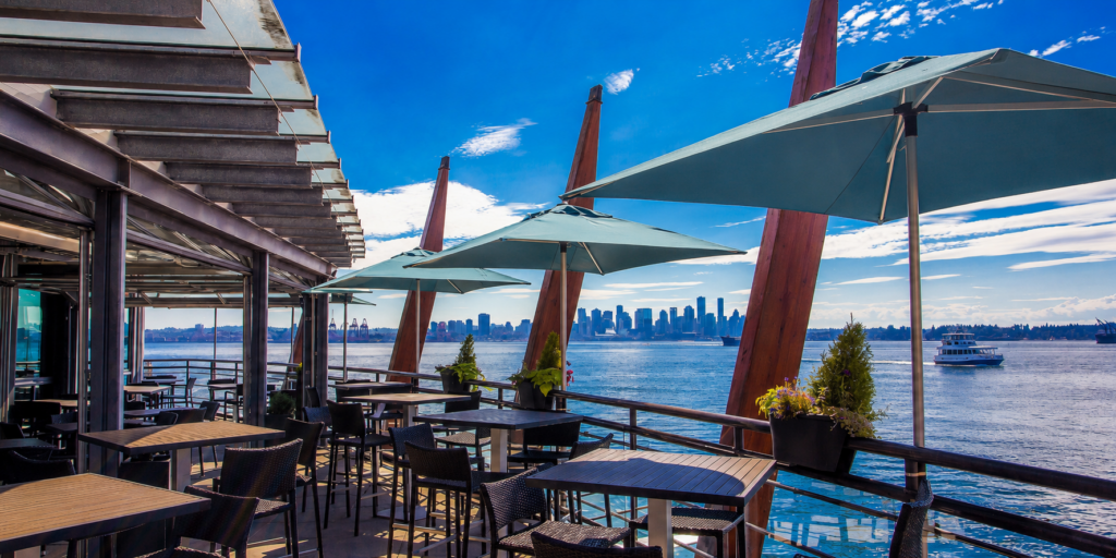 outdoor dining view vancouver local restaurant waterfront skyline Vancouver BC Patios worth knowing about
